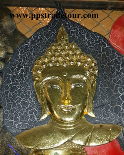 Wood buddha face panel