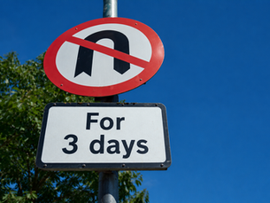 No U-turn road sign with supplementary sign reading "For 3 days", illustrating the difficulty of changing direction under pressure.