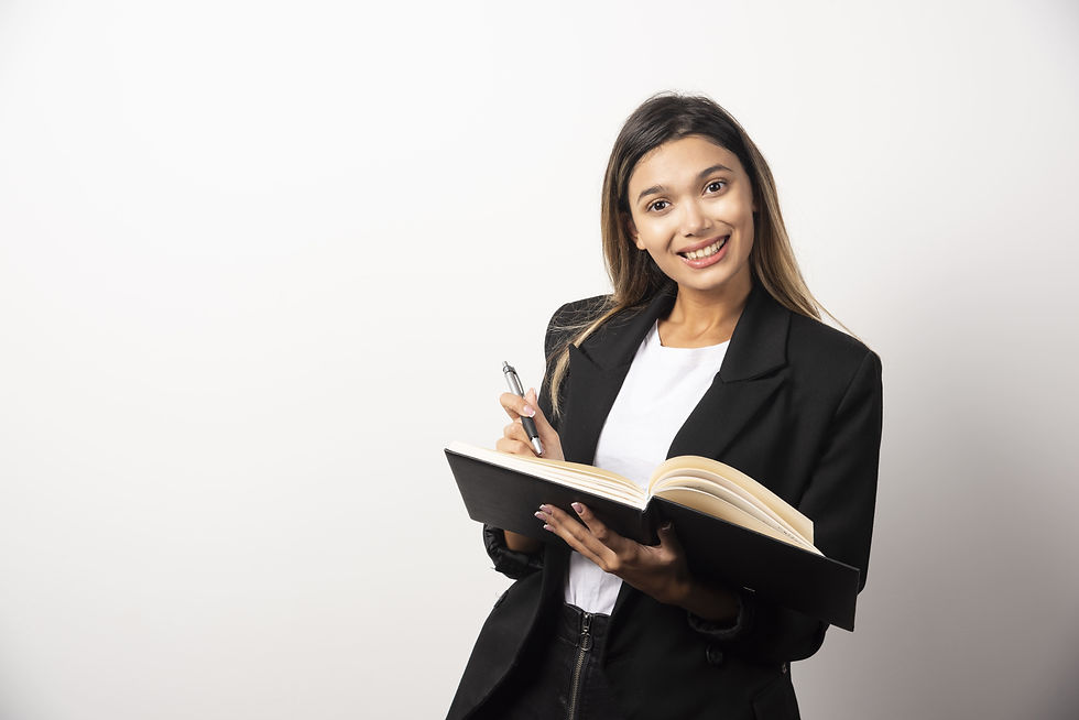 young-businesswoman-holding-opened-clipboard-with-pencil.jpg