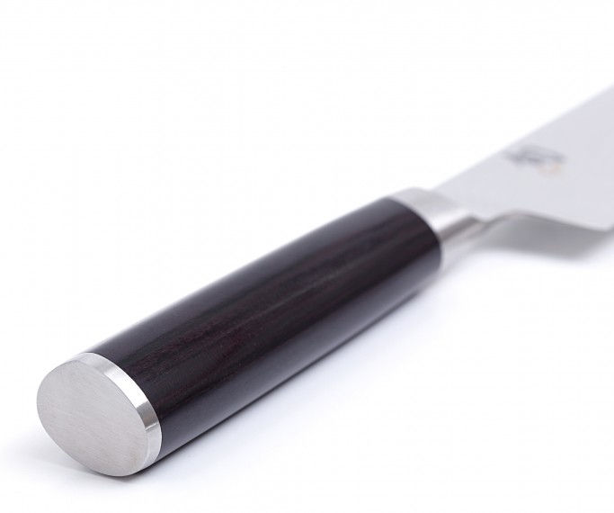 Miniaturbild: Schwarzer Messergriff in Nahaufnahme.