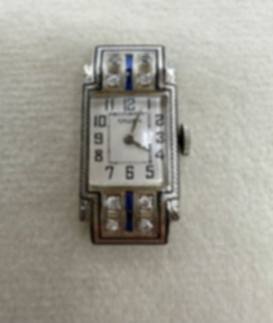 14 Karat White Gold .08ctw Diamond & .04ctw Sapphire Gruen Watch Face
