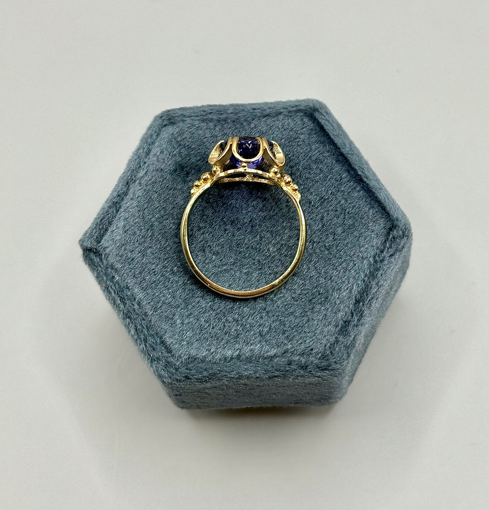 Thumbnail: 9 Karat Yellow Gold Tanzanite Flower Ring