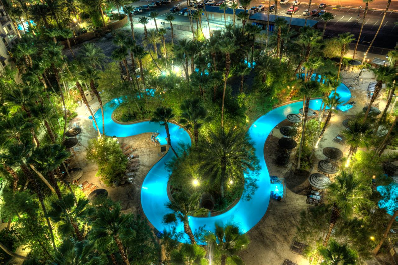 Tahiti Village lazy river lit up at night in Las Vegas