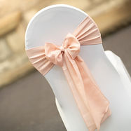 Wedding chairs sashes for a shabby chic party styling