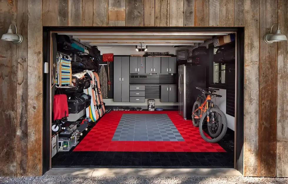 Interior design process: Garage combines functionality with modern style; storage cabinets, sports equipment sit on black and red checked flooring.