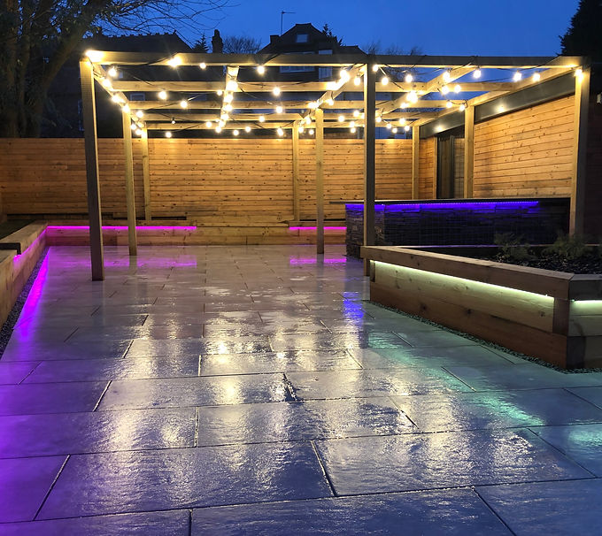 porcelain patio, timber raised planters, pergola, coloured garden lights, outdoor bar, cladding