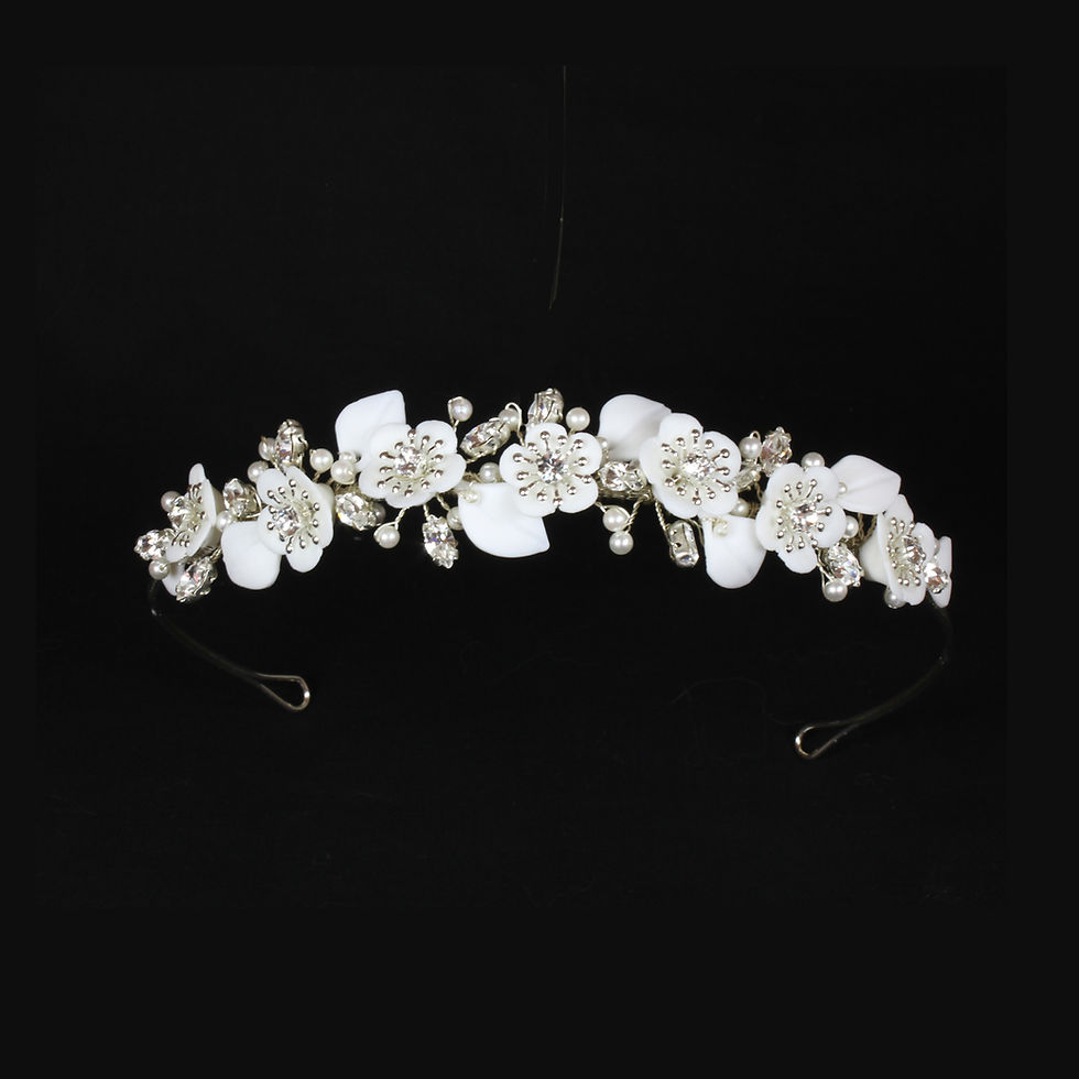Thumbnail: dainty porcelain flowers and shimmering crystal wedding headpiece