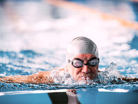 adult quietly swimming alone