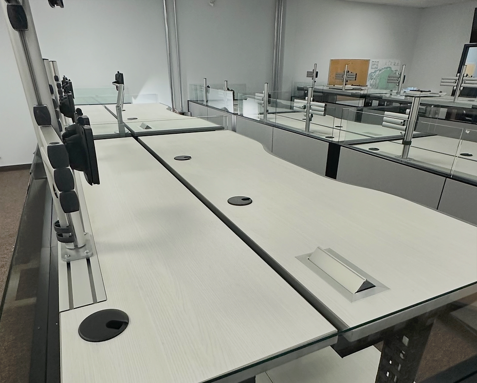 Eye-level view of a dispatch console with a laminate work surface and steel base.