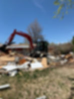 demolition and removal of an old mobile home so we can start new construction.