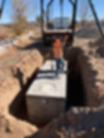 installation of a 1,000 gallon concrete septic tank
