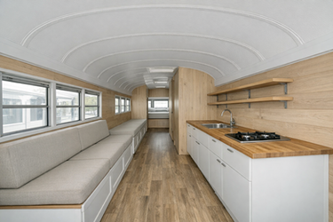 20251229_1927_Minimalist Skoolie Interior_simple_compose_01kdpac5qefh5r4z6mktce956b