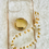 Thumbnail: gold and pearl phone charm