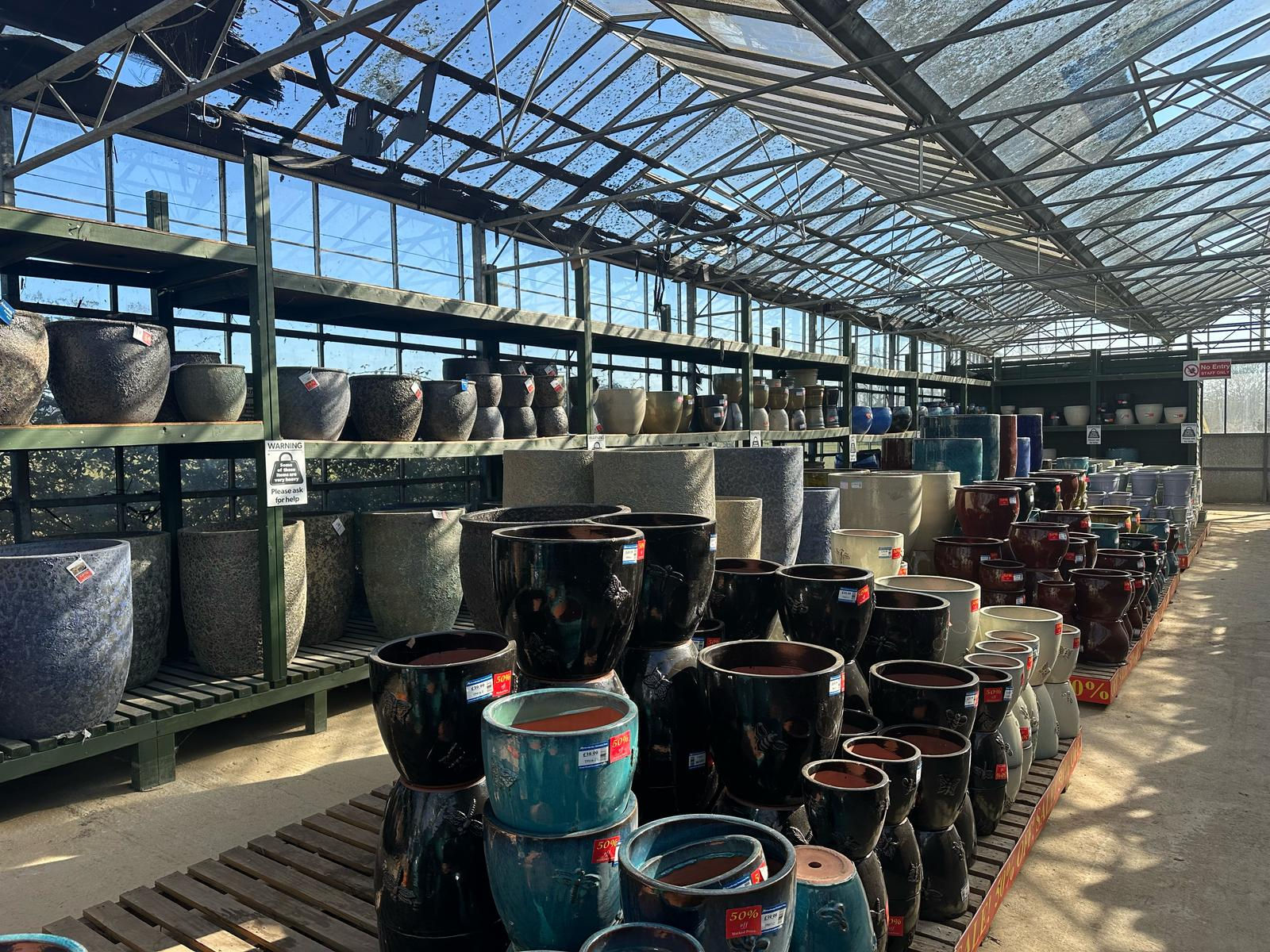 Great range of plastic planters and hanging baskets