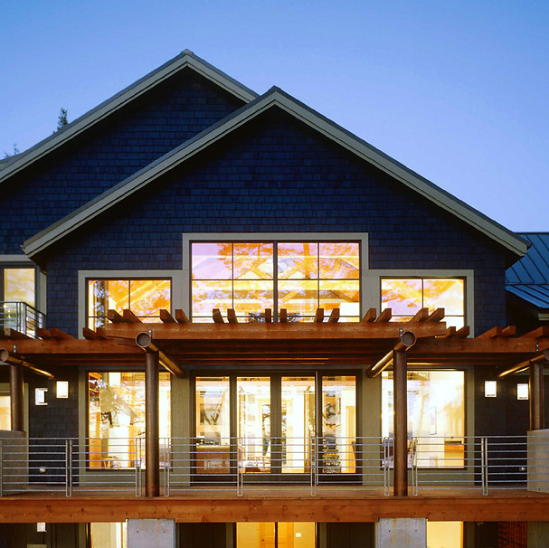 Bomgardner Residence contemporary back deck with shingles, concrete, steel and a wood trellis - Pelletier + Schaar
