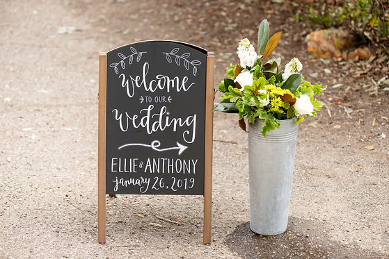 Welcome to our wedding chalkboard sign with flowers at Rancho La Patera and Stow House in Goleta, California