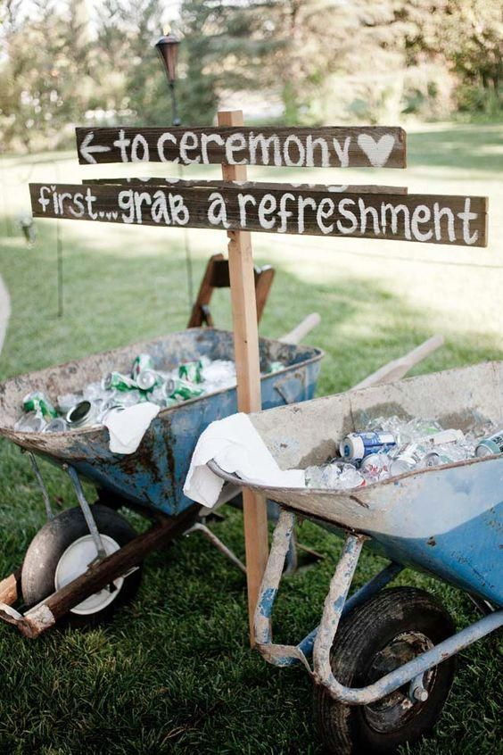 Wheelbarrows filled with ice and beverages