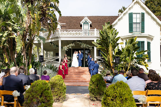 Bride and groom walking down the aisle at Rancho La Patera and Stow House in Goleta, California