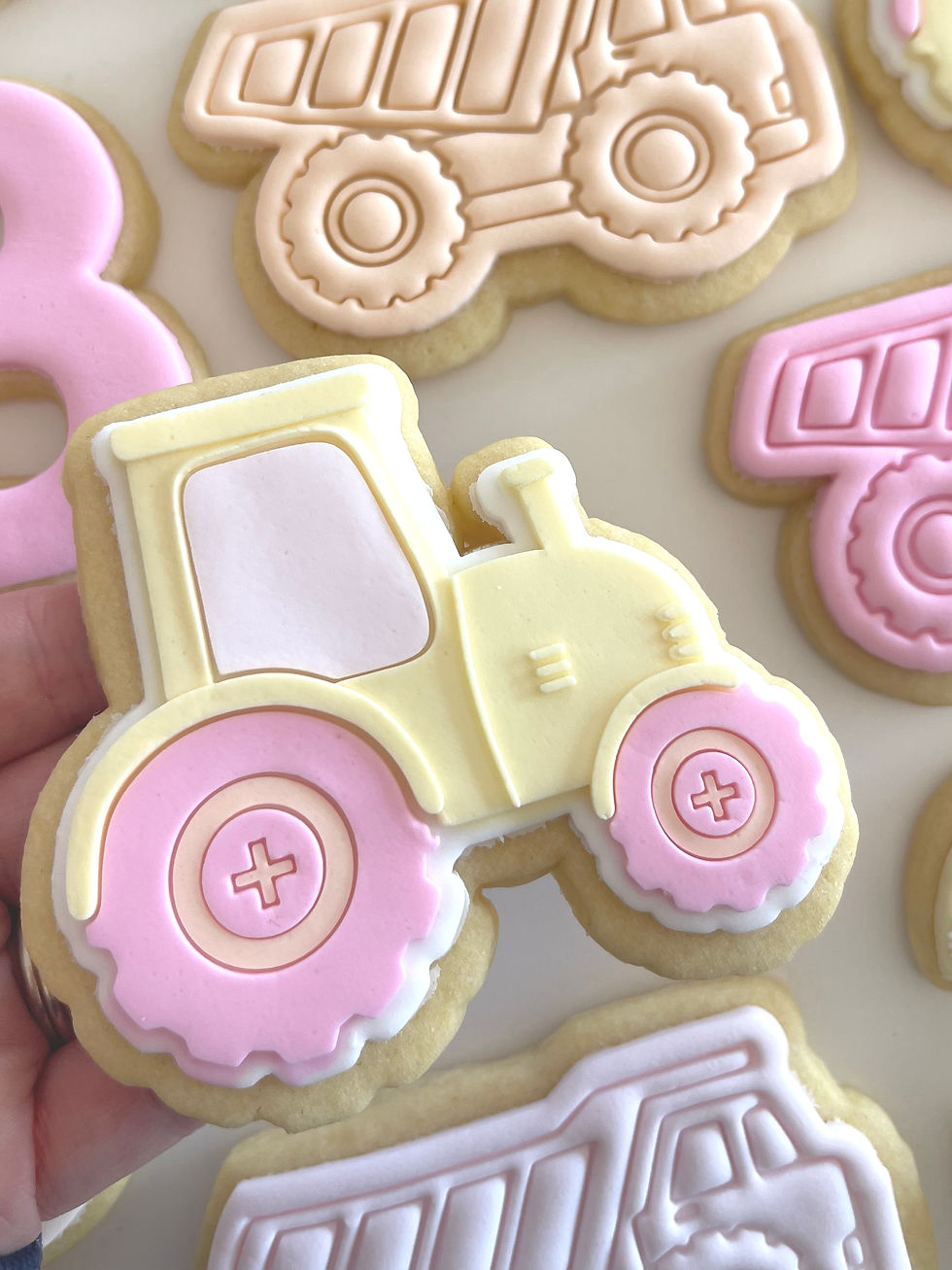 Tractor debosser with matching cutter