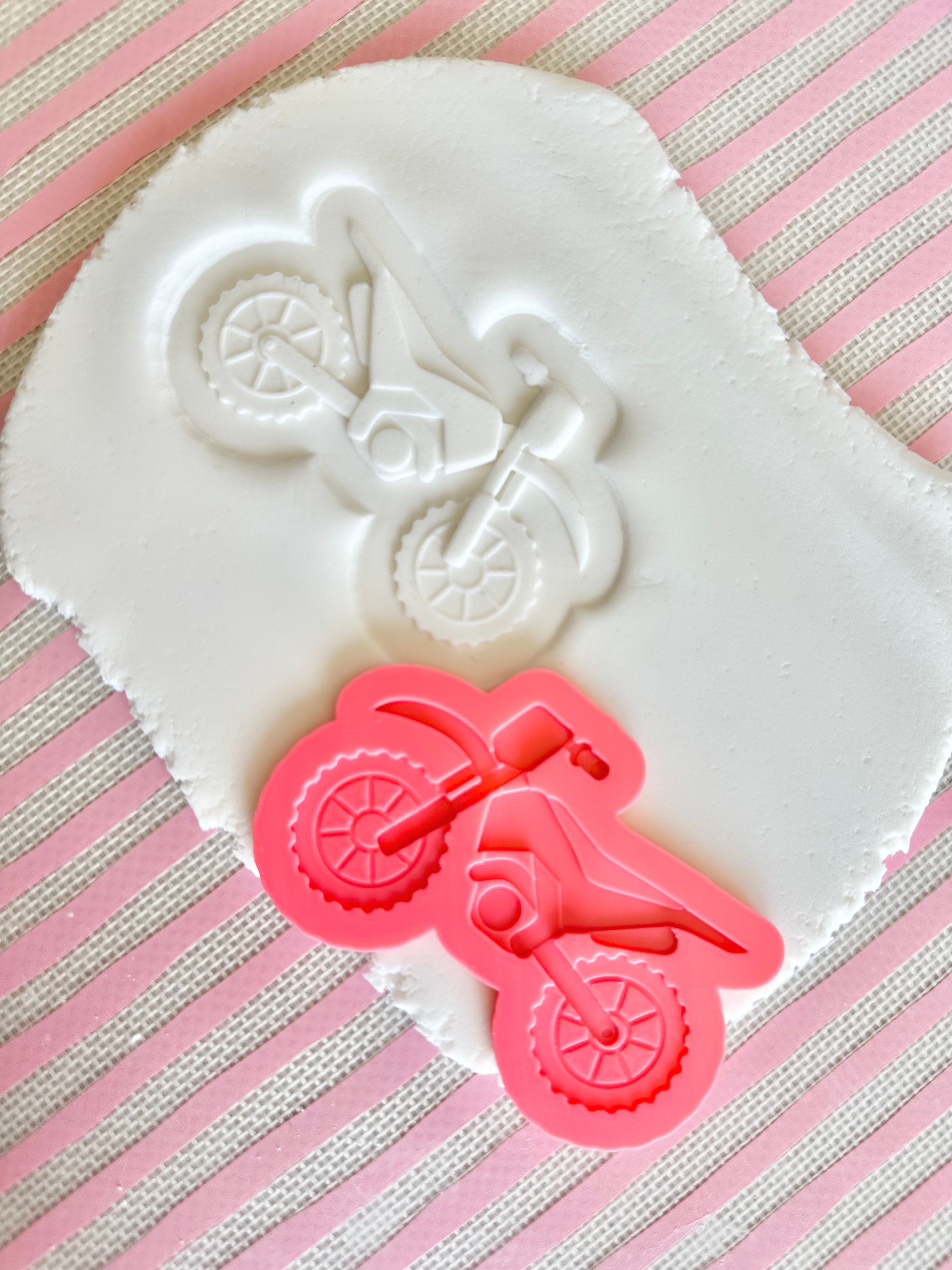 Motorbike debosser with matching cutter