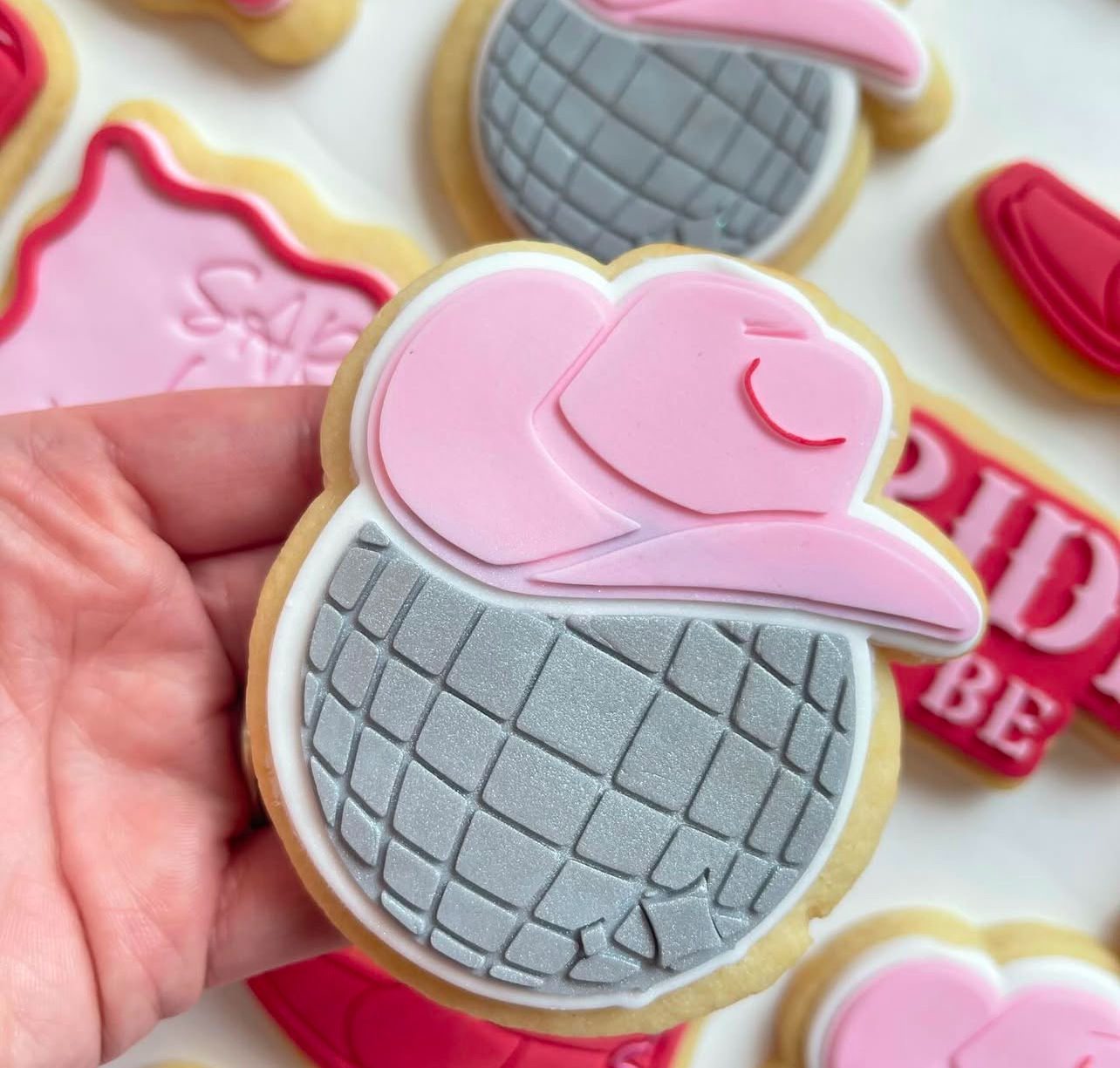 Disco ball with cowboy hat debosser with matching cutter