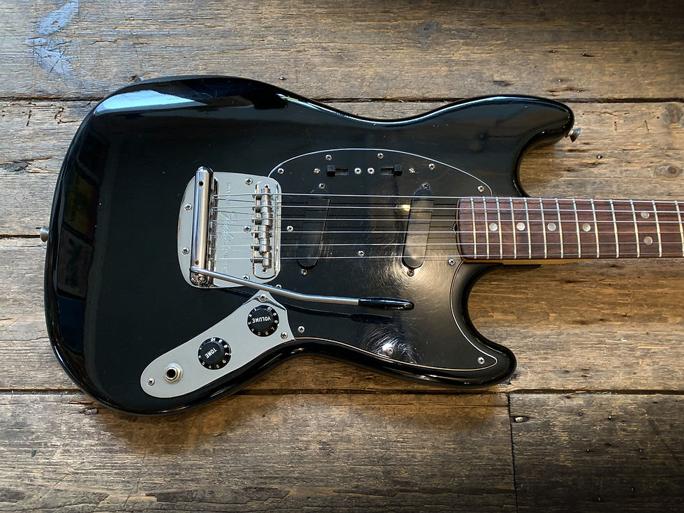 Thumbnail: 1978 Fender Mustang in black finish and hard shell case