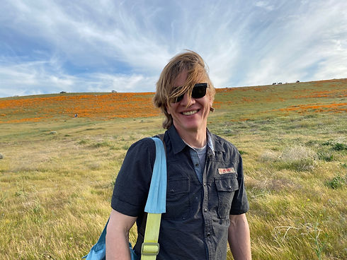 Curt-in-a-field.jpeg