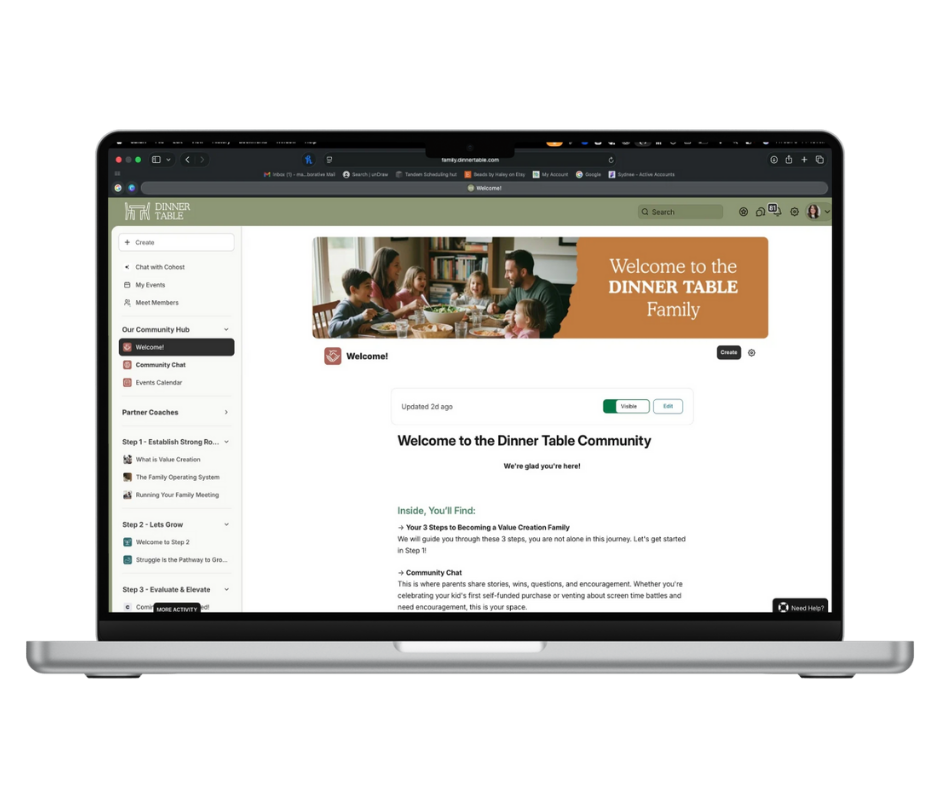 Laptop displaying Dinner Table Community website with family and text welcome message