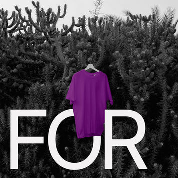 The word FOR behind a t-shirt hanging in front of foliage mockup edited and customized by Graphic Alchemy