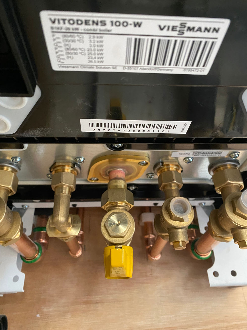 a close up of a gas valve with a barcode on it