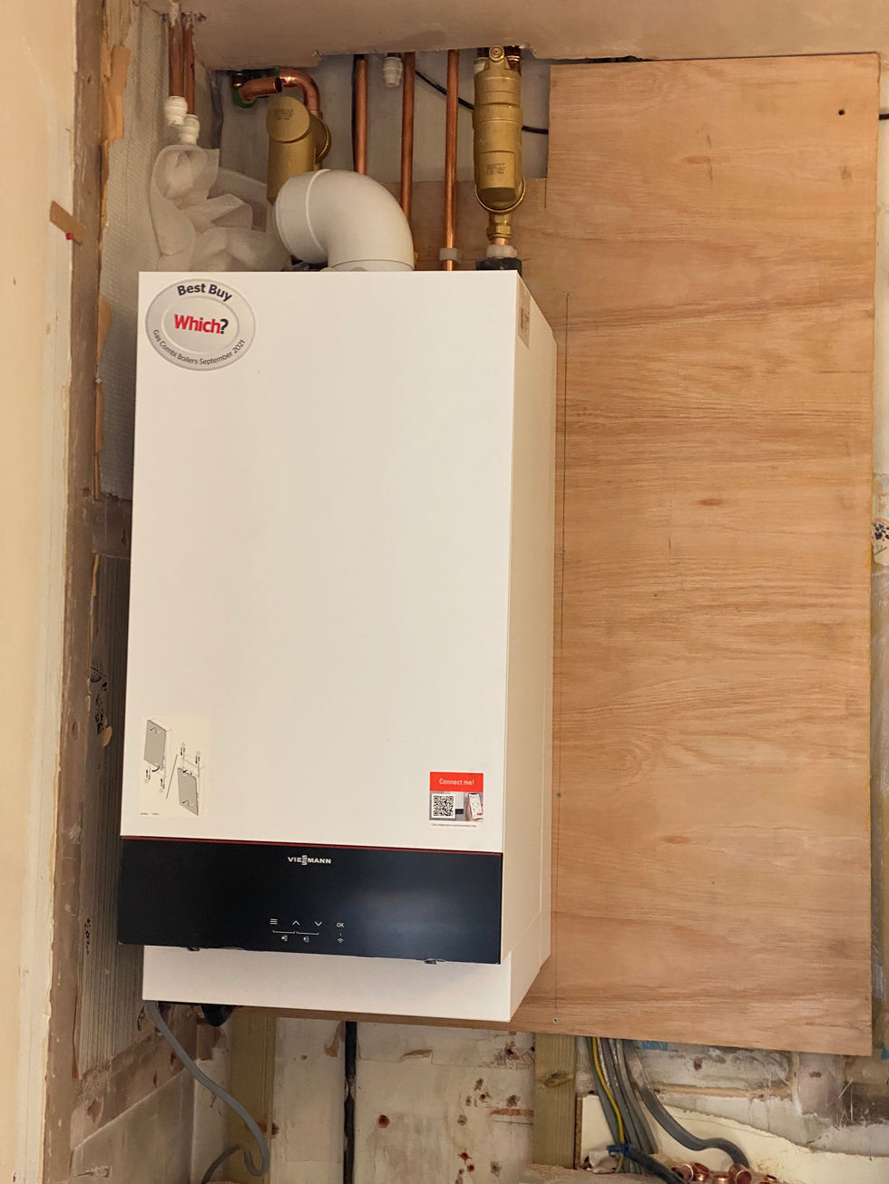 a white boiler with a sticker that says best buy which
