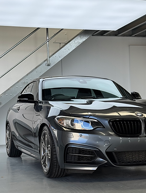 Ceramic coated vehicle in ONYX Elite Detailing showroom in Wangara, Perth displaying deep gloss and reflective finish