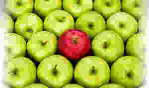 Green apples with a red exception