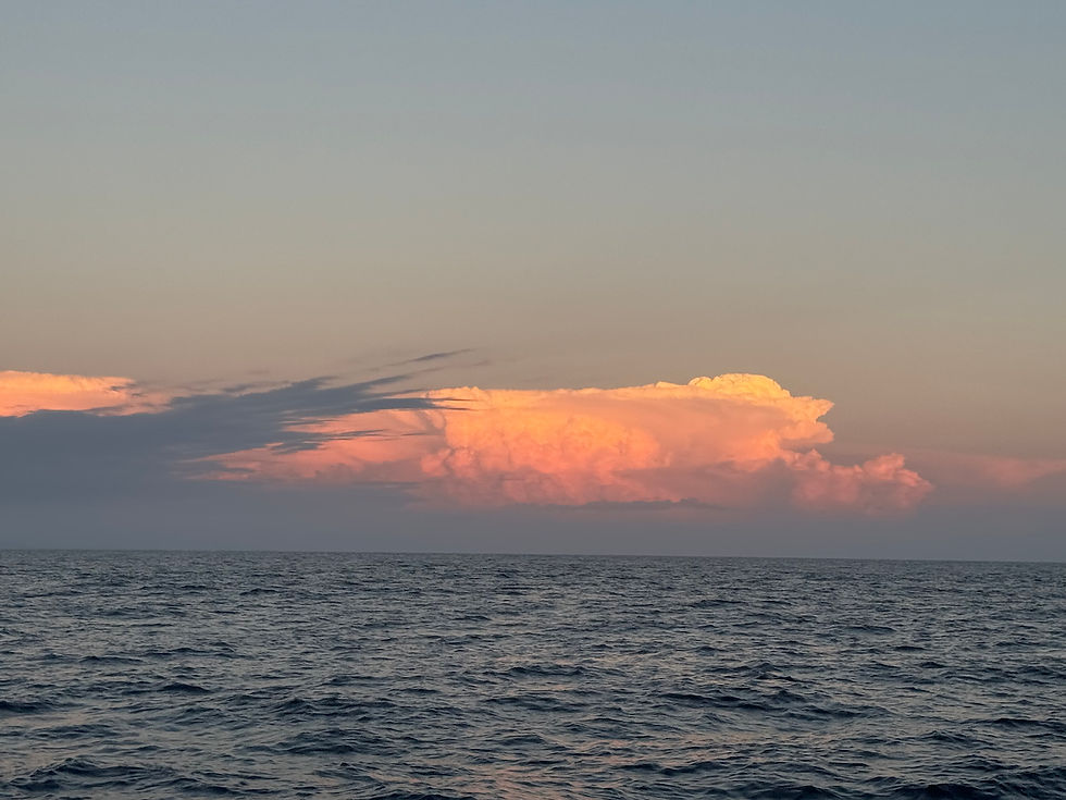 A thunderhead entertained us with lightning one night while at sea, but it kept its distance