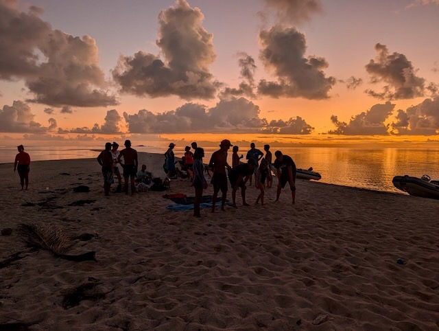 We joined the other boats anchored here for a Beach BBQ. Bocce ball in progress as the sun sets.