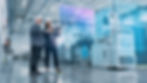 Factory Digitalization_ Two Industrial Engineers Use Tablet Computer, Big Data Statistics