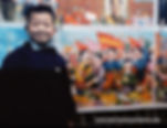Boy in Beijing, 1957, with posters showing prosperous and happy workers