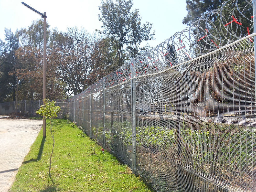 Chain link fence with razor wire