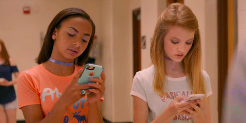girls on their cell gif