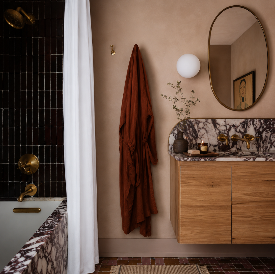 Spa-inspired primary bathroom remodel in Boulder County with natural stone and custom vanity by Vanessa Empire Interiors