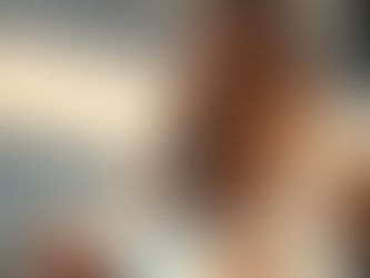 Woman traveling solo reading, drinking coffee