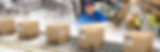 boxes on conveyor belt getting labelled .jpeg