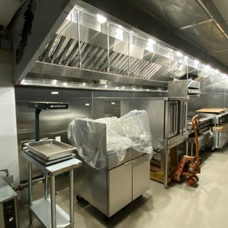 Honeysuckle restaurant dining space with bar and outdoor seating in Texas
