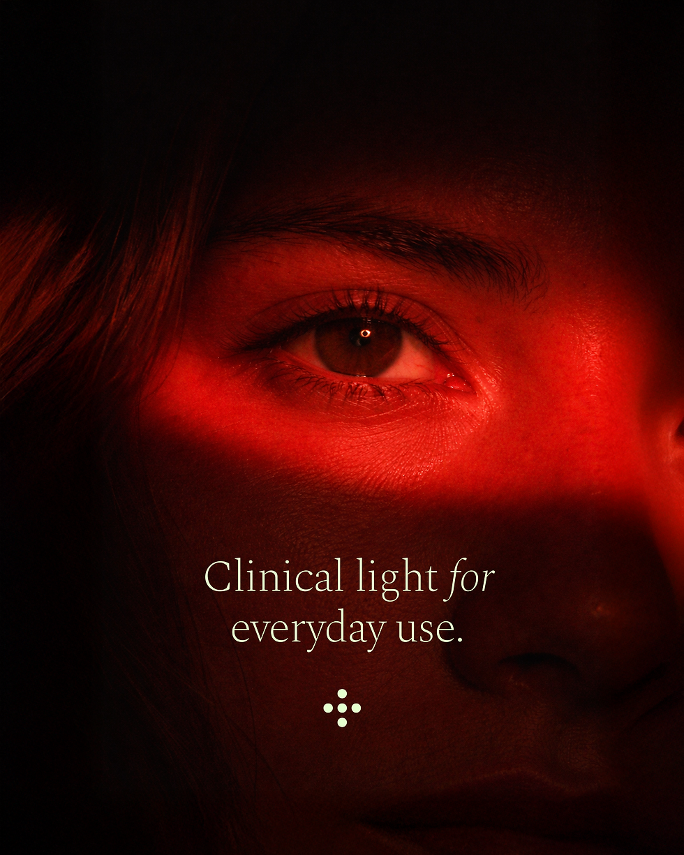 Close-up of an eye lit in red with the white text "Clinical light for everyday use."