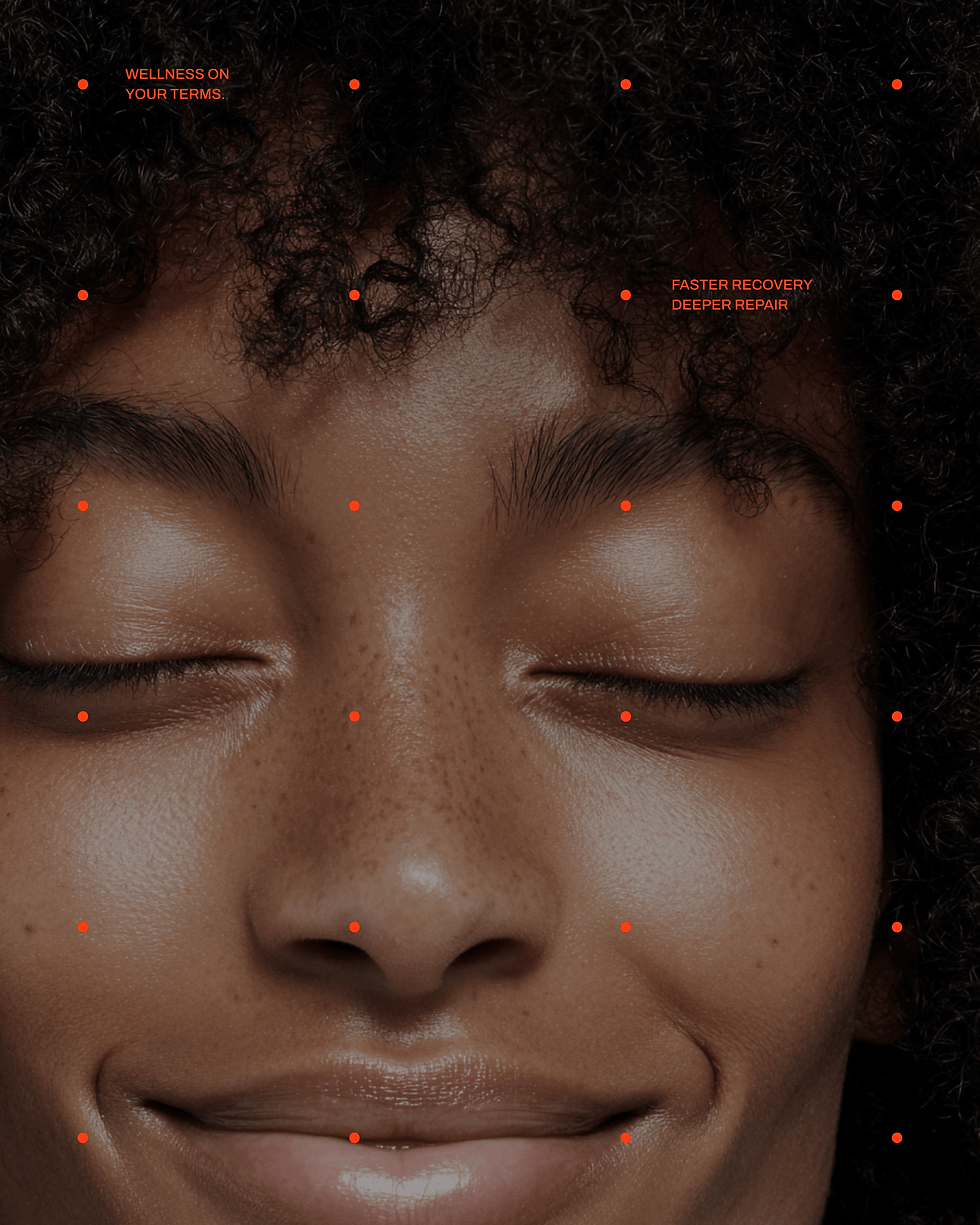 Close-up of a person with eyes closed and a gentle smile, overlaid with small orange markers highlighting Rejuv's skin and recovery benefits.