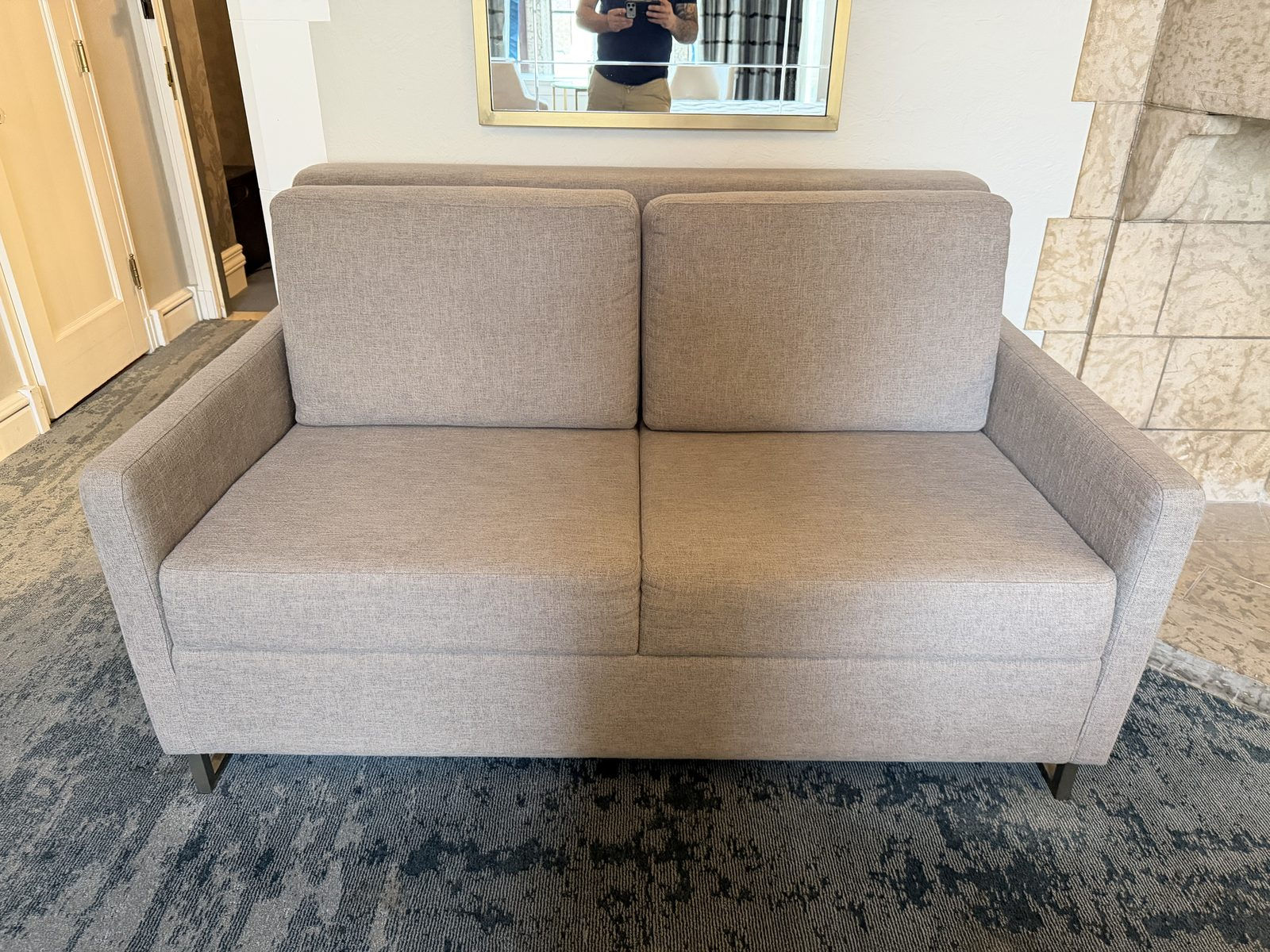 Modern grey loveseat, front view
