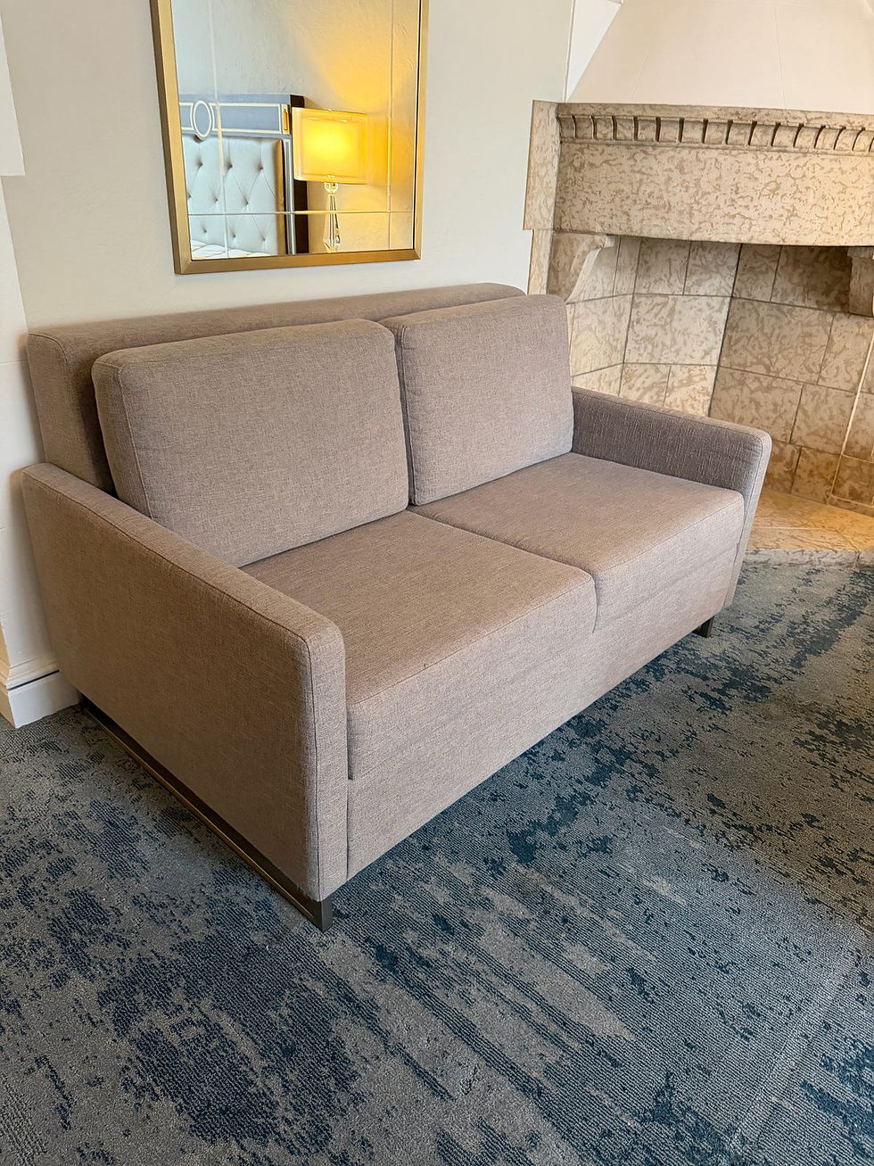 Thumbnail: Modern grey loveseat, angled side view