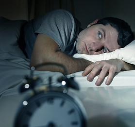 bigstock-Man-In-Bed-With-Eyes-Opened-Su-57346916.jpg