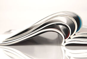 Stacked Open Magazines_edited.jpg