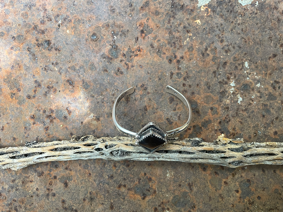 Thumbnail: The Tiger's Eye Venom Bangle